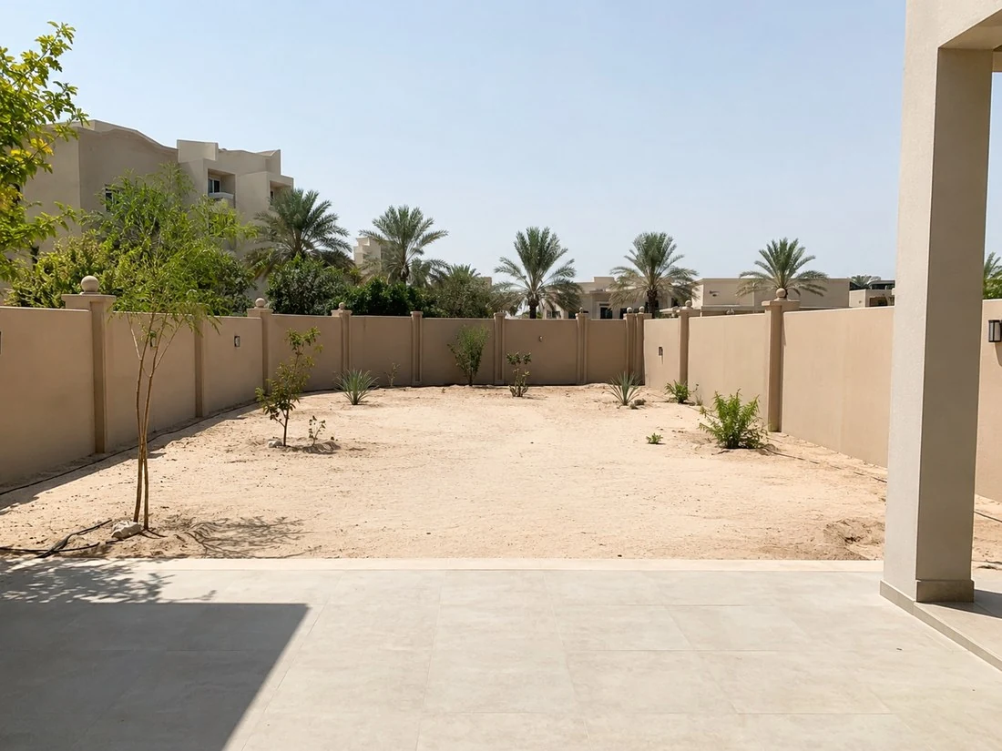 Before image of a bare family courtyard garden